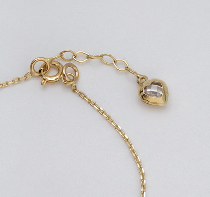 14 KT Yellow Gold Cross Bracelet With White Zircon Heart Shaped Tail TK GOLD