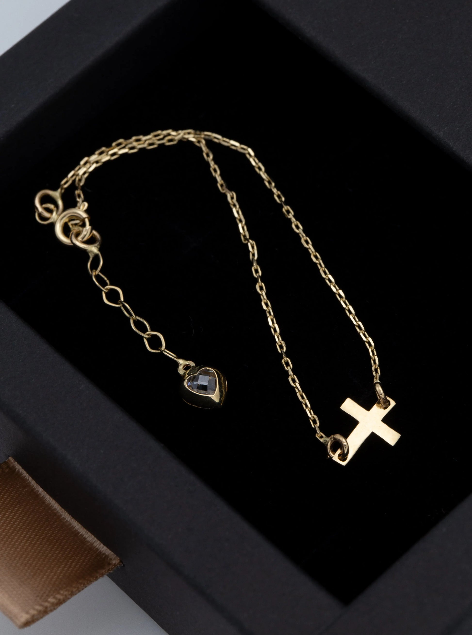 14 KT Yellow Gold Cross Bracelet With White Zircon Heart Shaped Tail TK GOLD