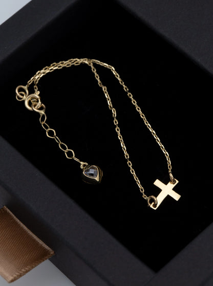 14 KT Yellow Gold Cross Bracelet With White Zircon Heart Shaped Tail TK GOLD