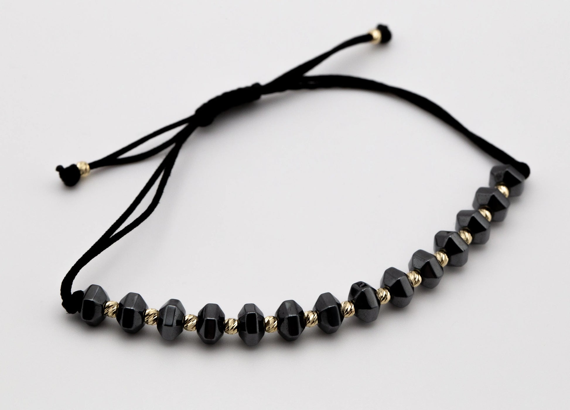 Black String Bracelet With Solid 14 KT Yellow Gold Beads TK GOLD